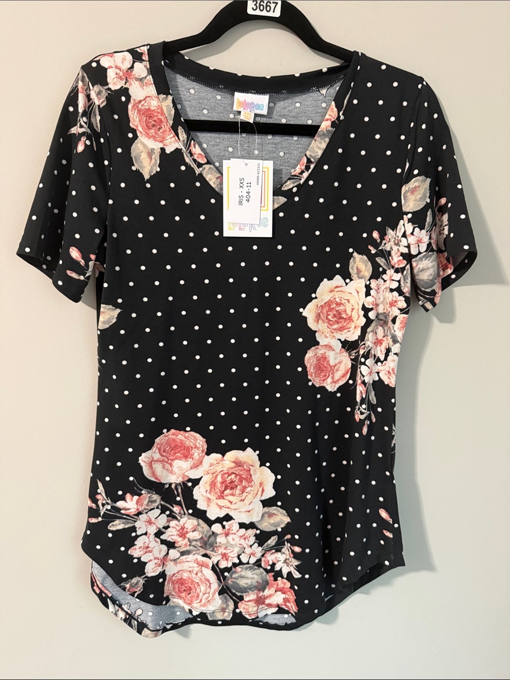 LuLaRoe Black Polka Dot Short Sleeve Top with Pink Rose Print